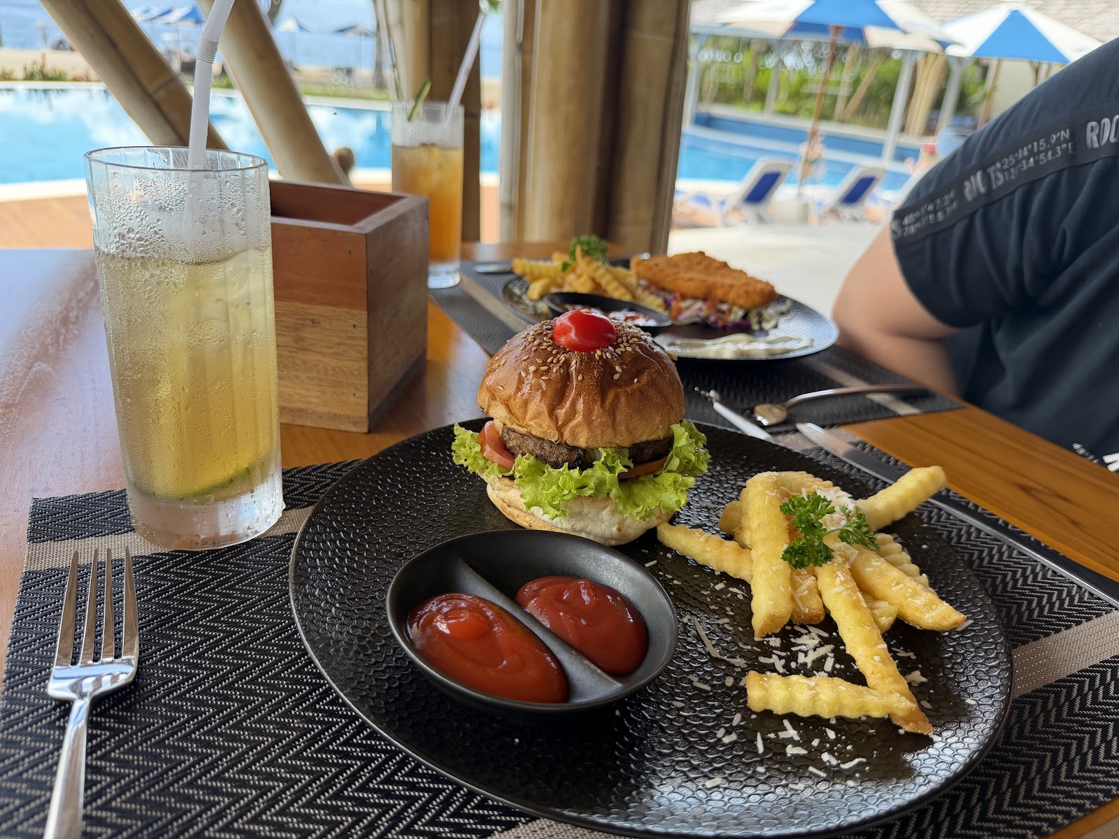 Burger, fries and iced drink