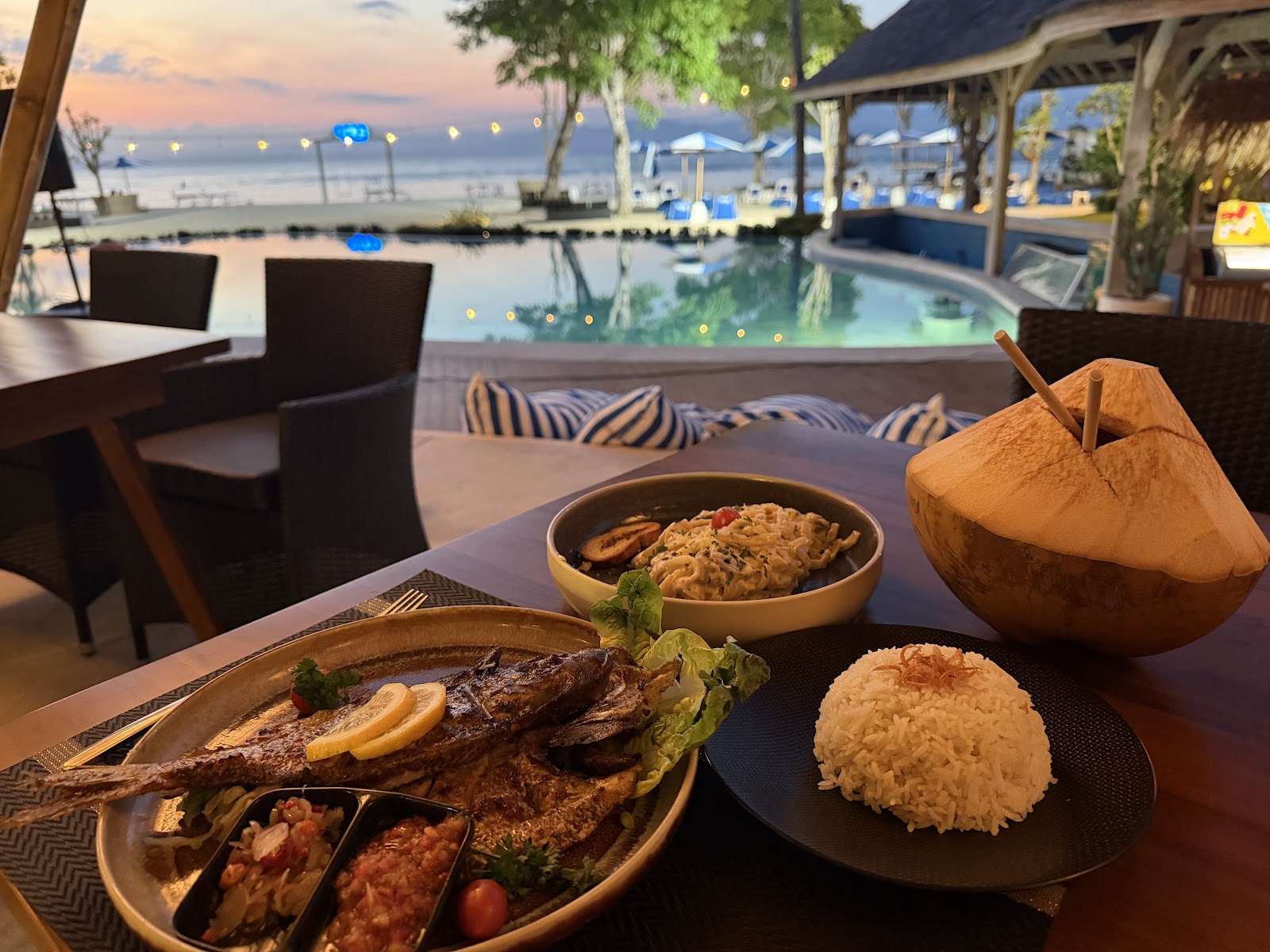 Grilled dish and fresh coconut