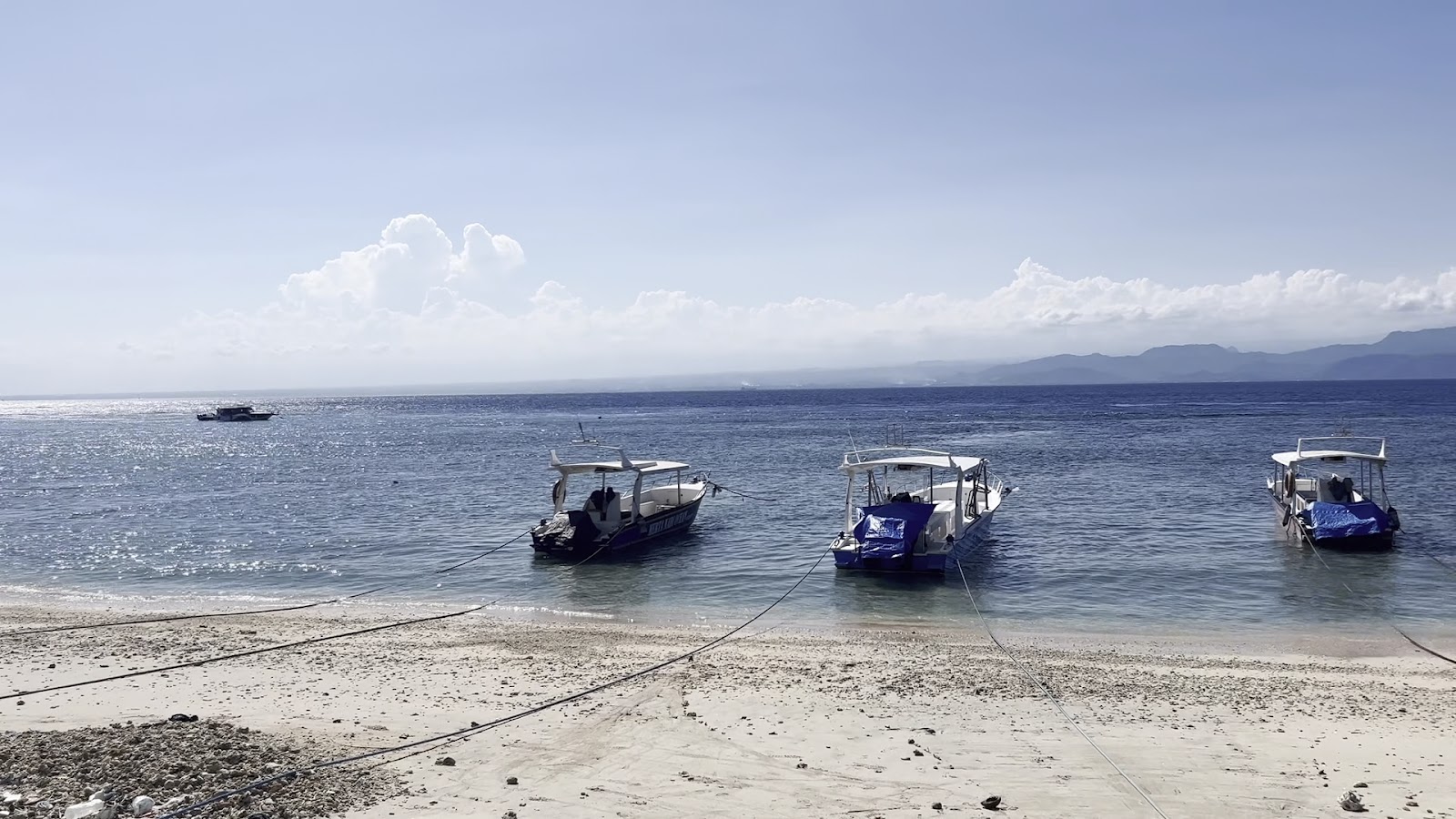 Boats moored off the shore of Nusa Penida