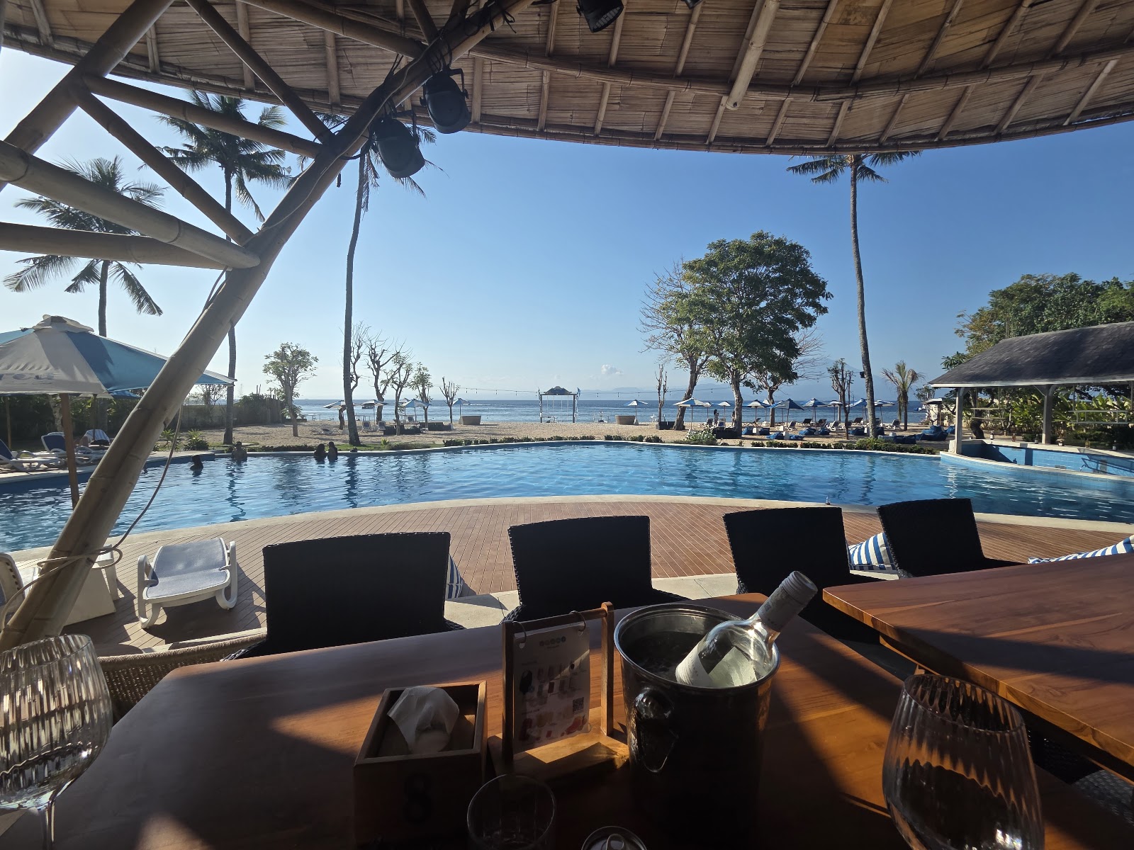 Poolside seating at Orca Beach Club