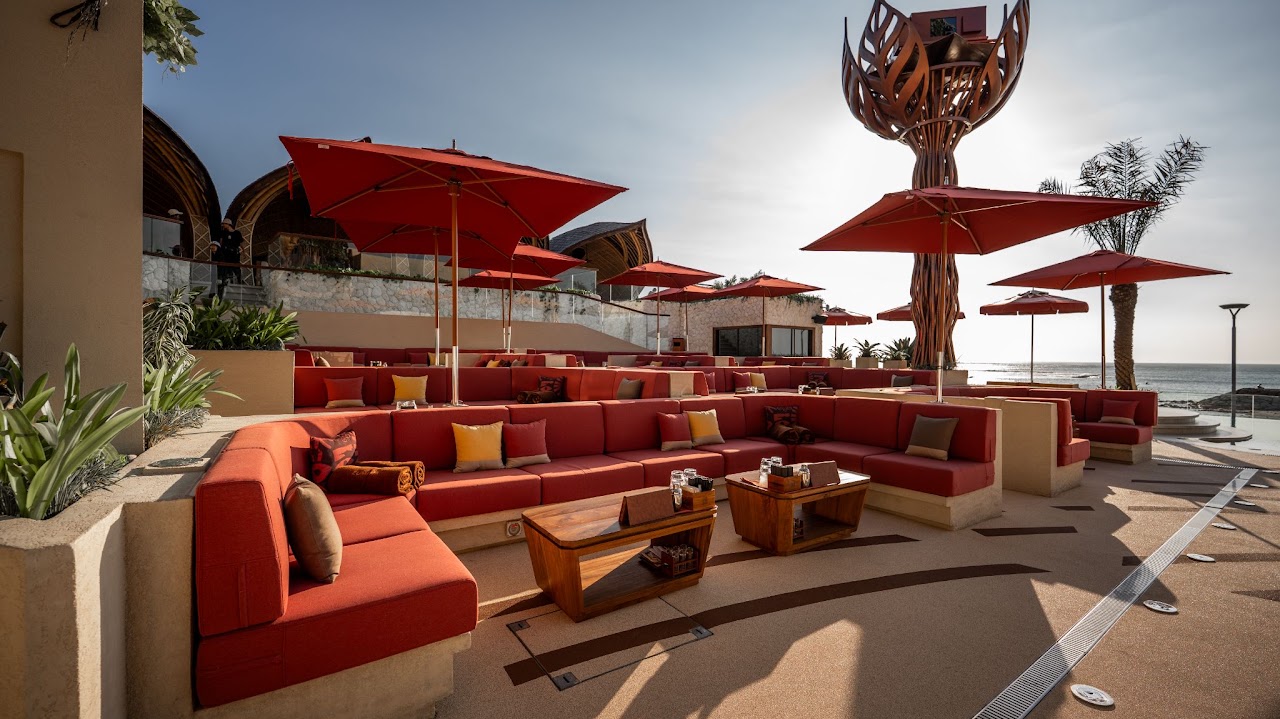 Red sofa lounge terrace overlooking the ocean