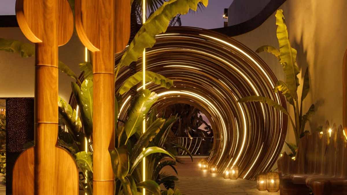Glowing curved tunnel lights creating a warm ambience